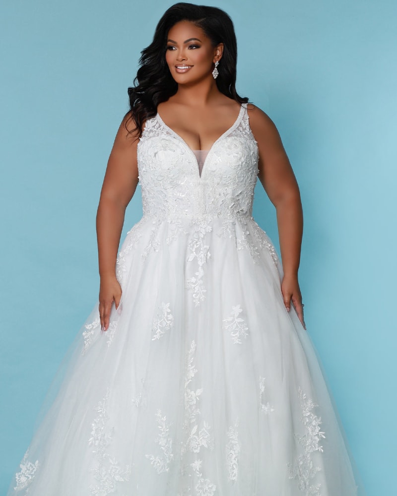 Front of a model wearing a size 16 Marlowe Wedding Dress in Ivory by Sydney's Closet. | dia_product_style_image_id:286702